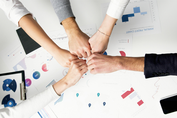 Business team with hands in