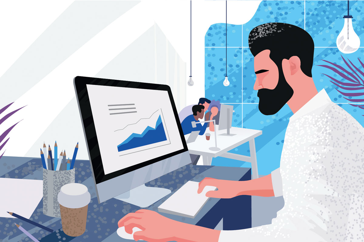 Photo of a developer working at a desk